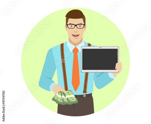 Businessman with cash money holding digital tablet