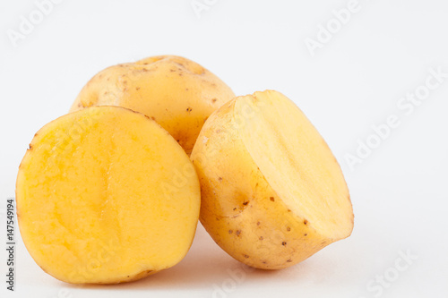 Yellow potato (Solanum phureja) isolated in white background