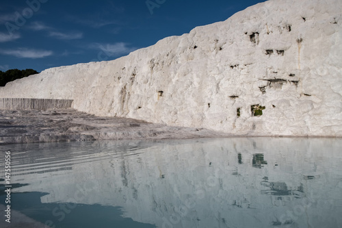 Pamukkale Thermal Pools, Pamukkale in south-west Turkey, cotton castle. The city contains hot springs and travertines, terraces of carbonate minerals left by the flowing water.