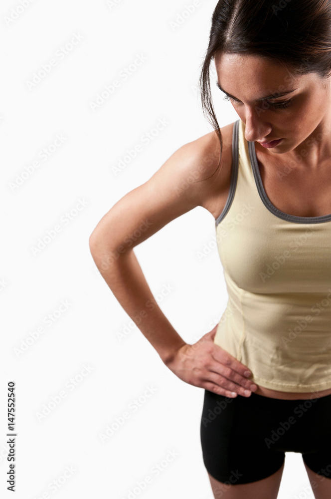 Runner resting with hand on hip Runner resting with hand on hip