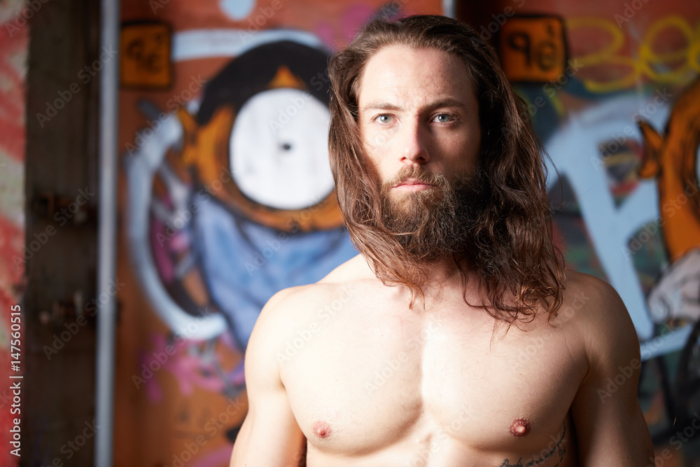 © Stocked House Studio - portrait of young bearded long haired man