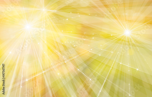 Vector yellow background with rays, stars and lights.