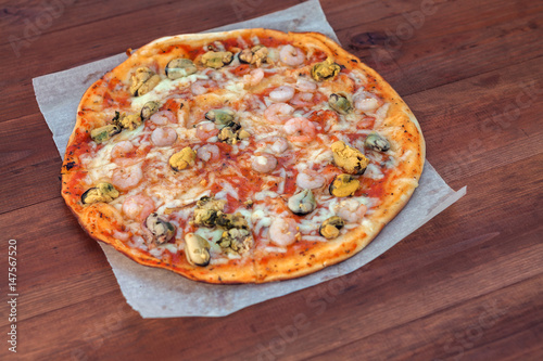 pizza on wood background