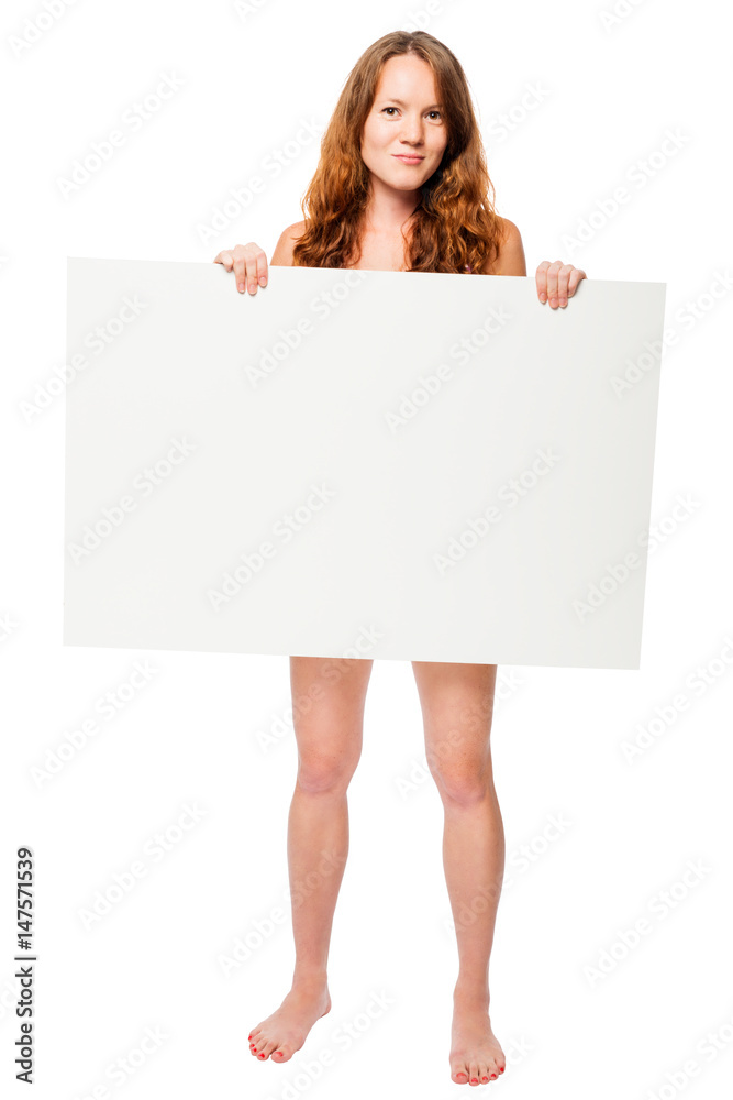 Barefooted naked woman hiding behind a white billboard in the studio Barefooted naked woman hiding behind a white billboard in the studio
