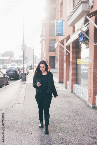 Photography young beautiful woman using smartphone