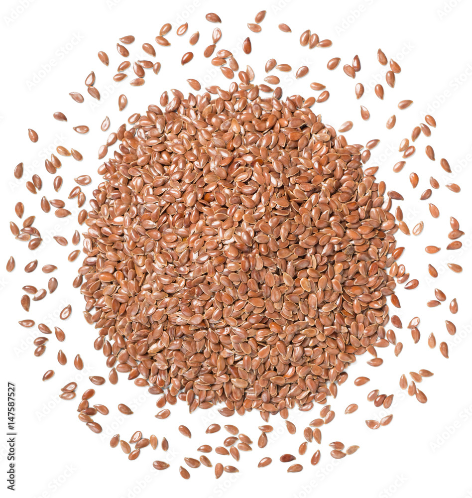 raw flaxseeds on white, (large depth of field, taken with tilt shift lens) raw flaxseeds on white, (large depth of field, taken with tilt shift lens)