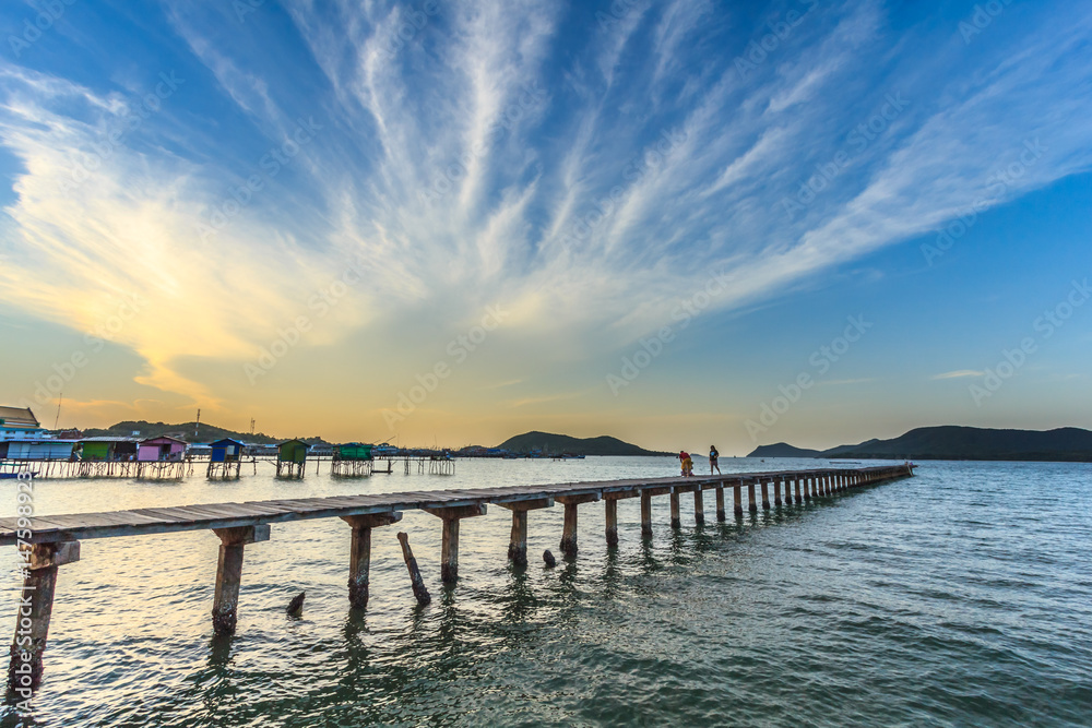 Beautiful sky and wooden bridge pier with twilight sky at morning time Beautiful sky and wooden bridge pier with twilight sky at morning time