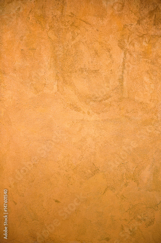 concrete wall background with old and rough on brown background