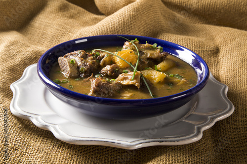 rustic Stew meat with manioc called Vaca atolada in Brazil. photo