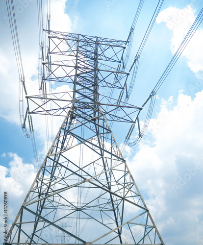 Bild auf Leinwand high voltage post.High-voltage tower sky background.