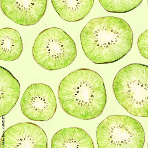 Watercolor seamless pattern with kiwi slices. Repeating green fruit background