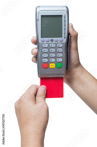 Wallpaper Mural Hand holding credit card swipe through terminal for sale isolated on white Torontodigital.ca