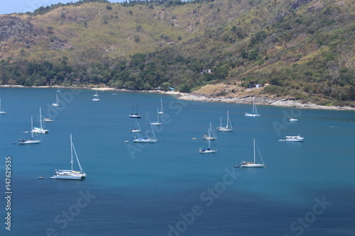 Boats cruising in the sea a perfect holiday view giving you vacation goals.