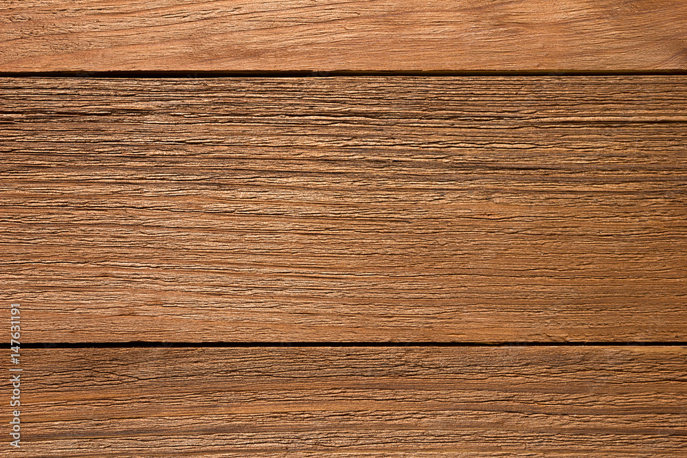 Fototapeta premium Texture of dark wooden boards, top view closeup