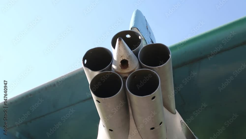 Jet fighter with rocket launchers on wings. Rocket launcher under the