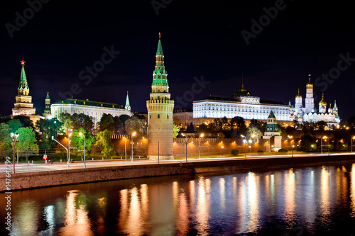 Moscow Kremlin at night. Embankment with car traffic view photo