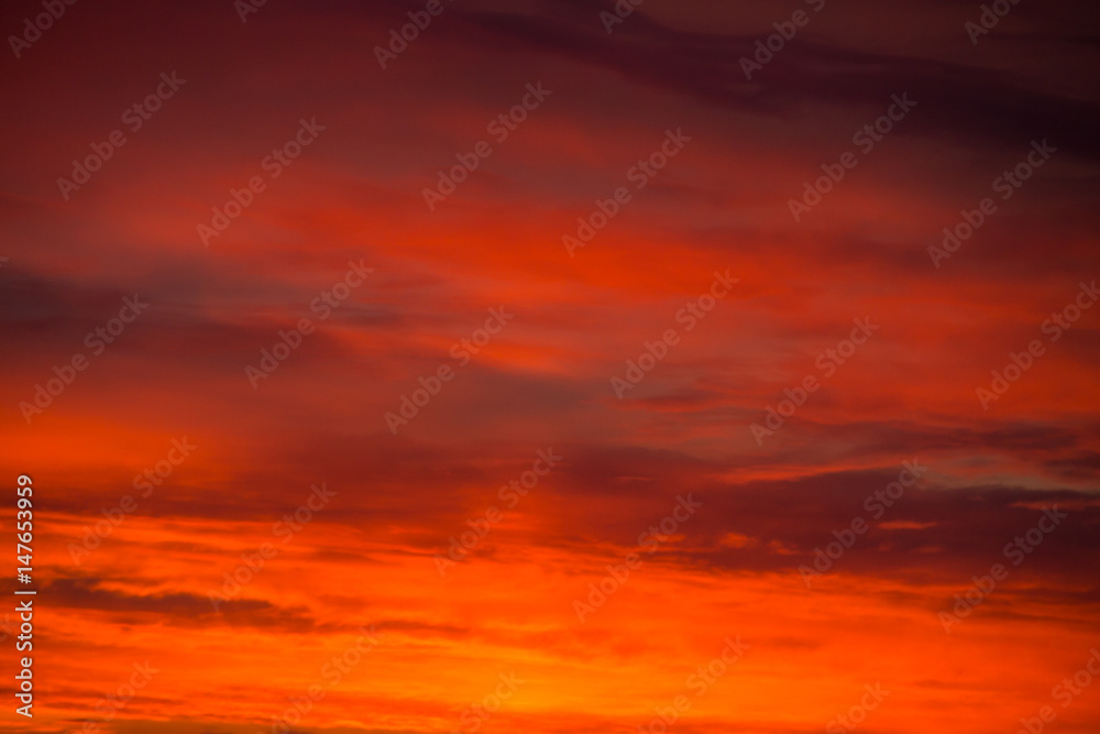 Fiery orange sunrise sky