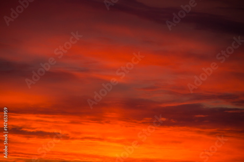 Fiery orange sunrise sky
