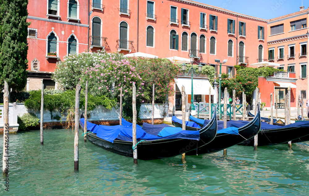The gondolas are at the pier in Venice. Grand Canal in Venice. The symbol of Venice,Italy