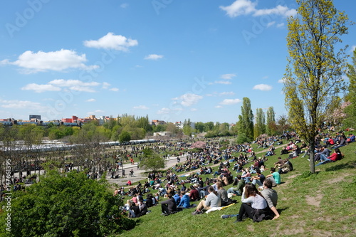Fototapeta Naklejka Na Ścianę i Meble -  People at park (Mauerpark) on a sunny day in Berlin
