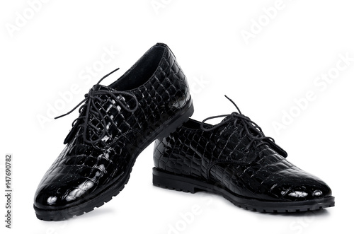 Classical pair of patent black male shoes