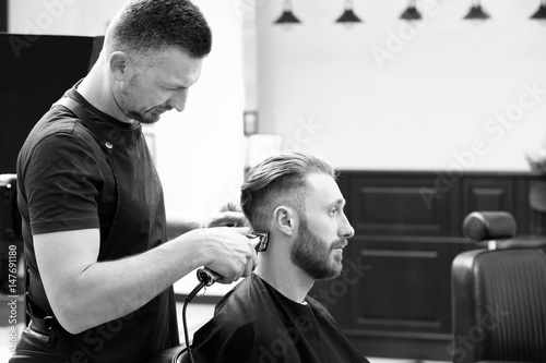 Barber making modern male h...