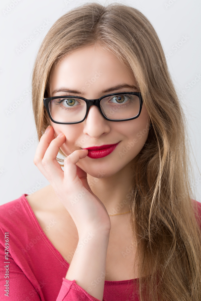 portrait of young woman with black glasses