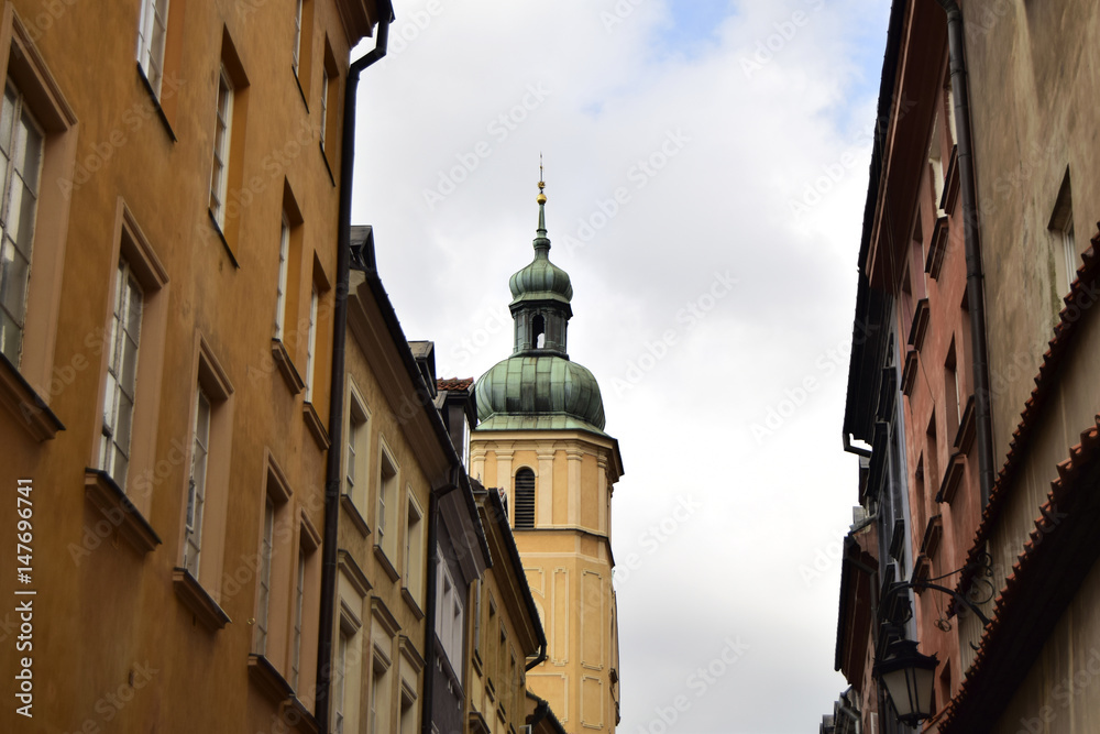 Naklejka premium Fragment of the narrow street. Architecture of the old city of Warsaw. Poland.