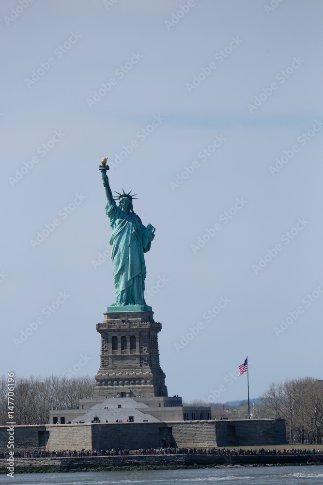 Statue of Liberty against blue sky