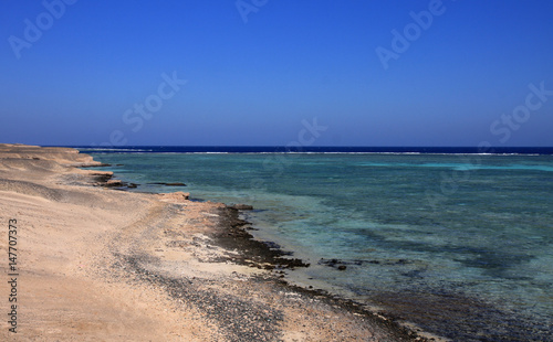 Sea view with deep blue sky and crystal water area  blue lagoon of the Red Sea in the country of Egypt
