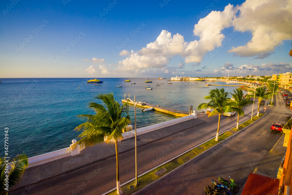 Fototapeta premium Pier of Cozumen Island, people usually walks around and enjoy the view. Beautiful sunset