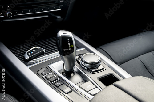 Obraz na płótnie automatic gear stick of a modern car, car interior details