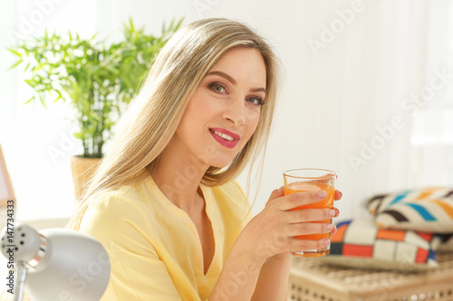 Beautiful young woman with ...