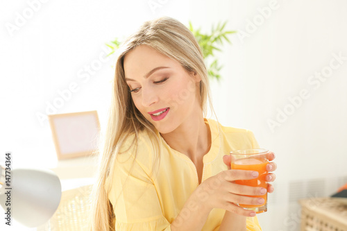 Beautiful young woman with ...