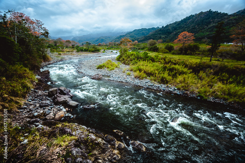 The river at the valley of Orosi in the country of Costa Rica photo