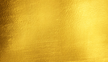 Shiny yellow leaf gold foil texture