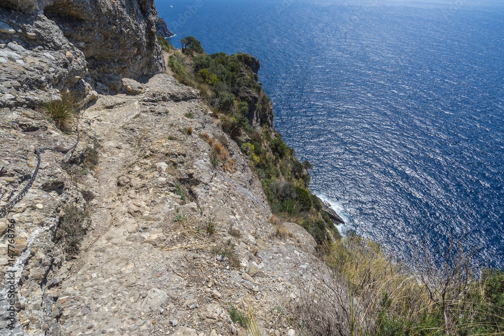 Scenic hiking trail of Tigullio promontory overlooking the Mediterranean Sea, Liguria, Italy