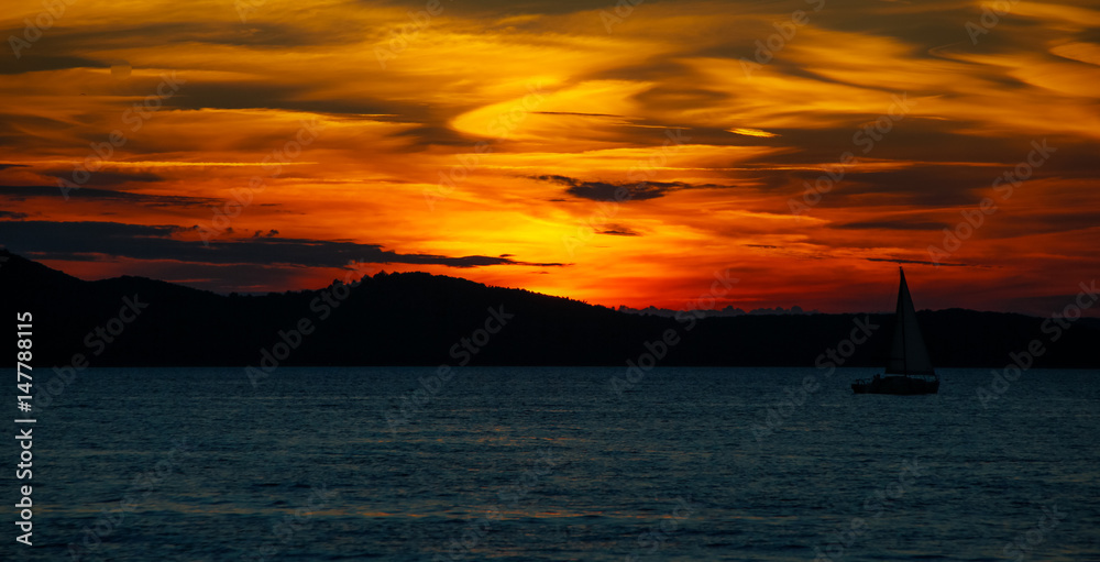 Sailboat at Golden Sunset