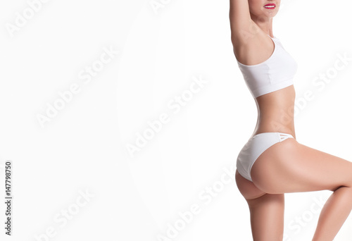 Slim and sporty female body, diet concept