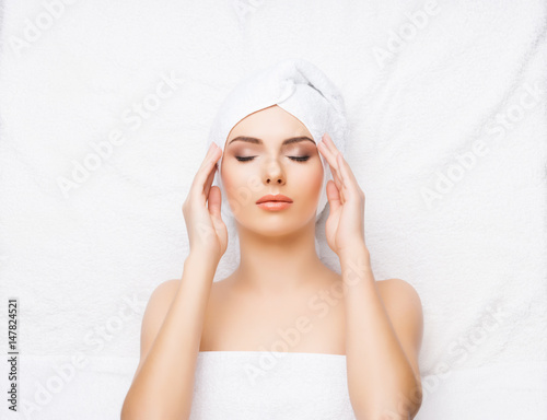 Beautiful, young and healthy woman in spa salon. Spa, health and healing concept.