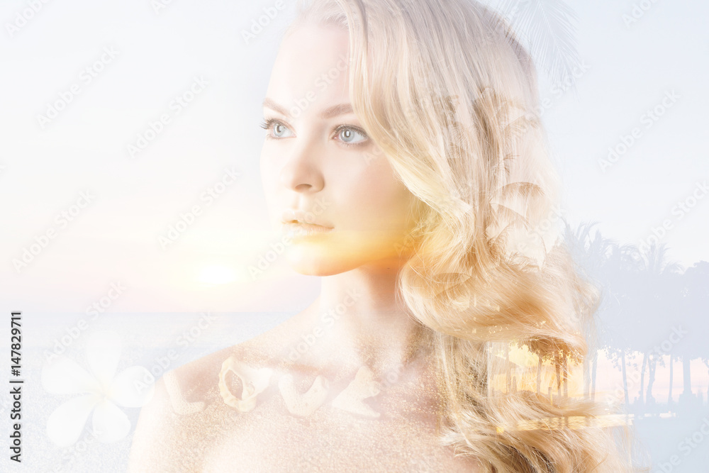 Beautiful blond woman and sunset sea. Concept of travel and vacation.