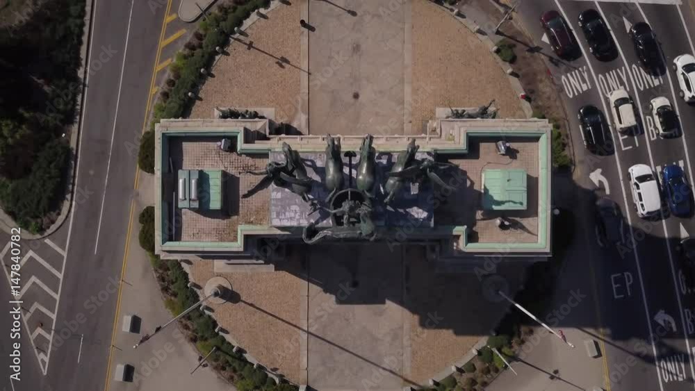 starting directly over the arch in Grand Army Plaza and pulling back / tilting up starting directly over the arch in Grand Army Plaza and pulling back / tilting up