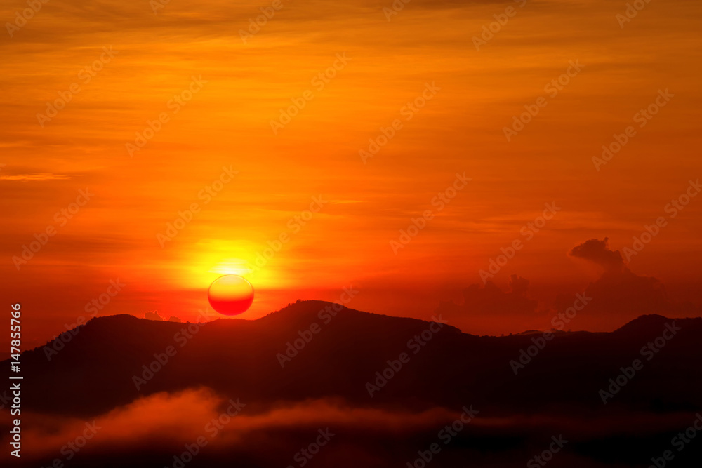 Sunrise over the mountain with copy space,misty morning in Thailand.