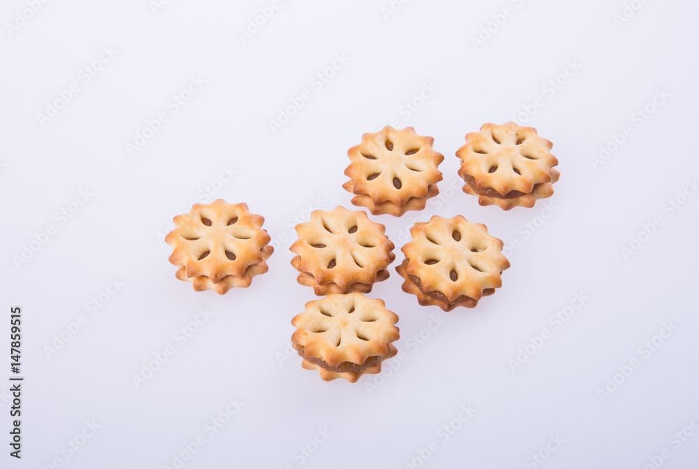 cookie biscuits with filling on background
