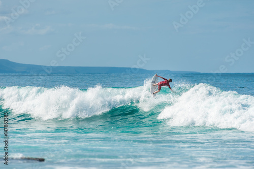 Surfer riding the ocean waves