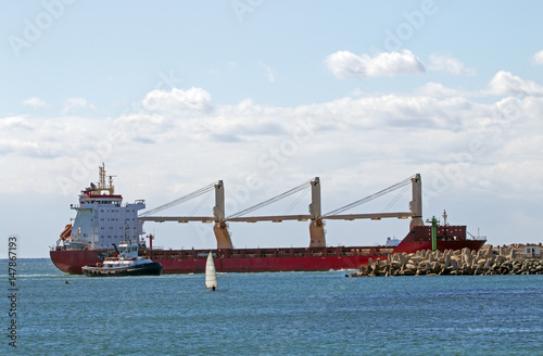 Vessel and Tugboat  Entering Harbor in Durban