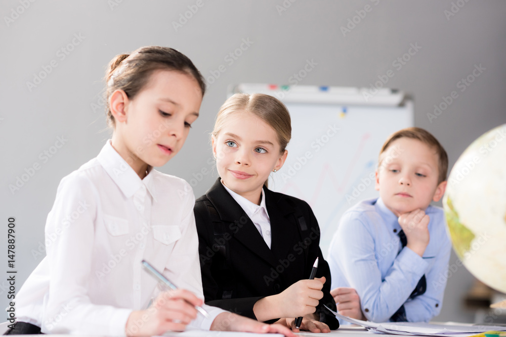 Fototapeta premium Cute children working in office