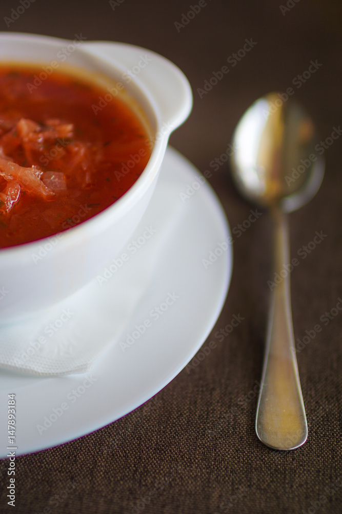soup in a white plate with baked tortilla soup in a white plate with baked tortilla