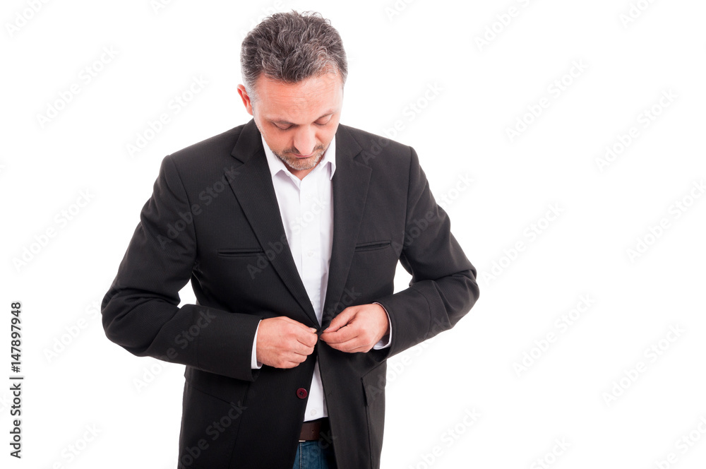 Successful guy dressing up for an appointment Successful guy dressing up for an appointment