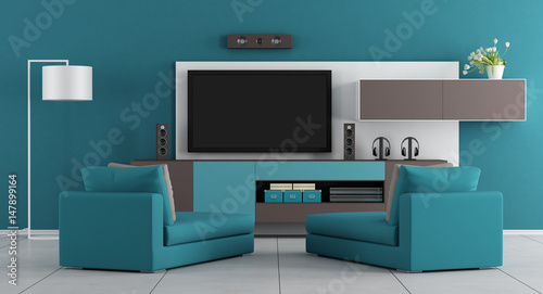 Blue living room with tv © archideaphoto